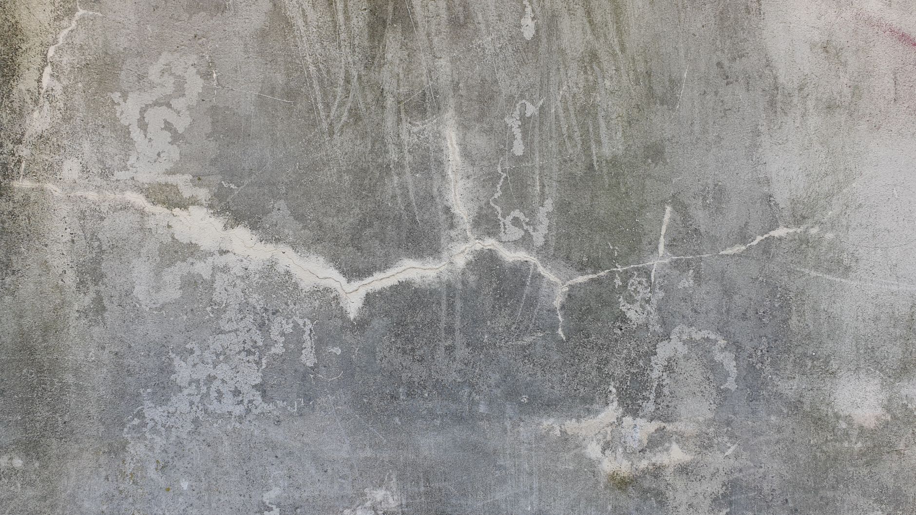 cracked sinking concrete driveway
