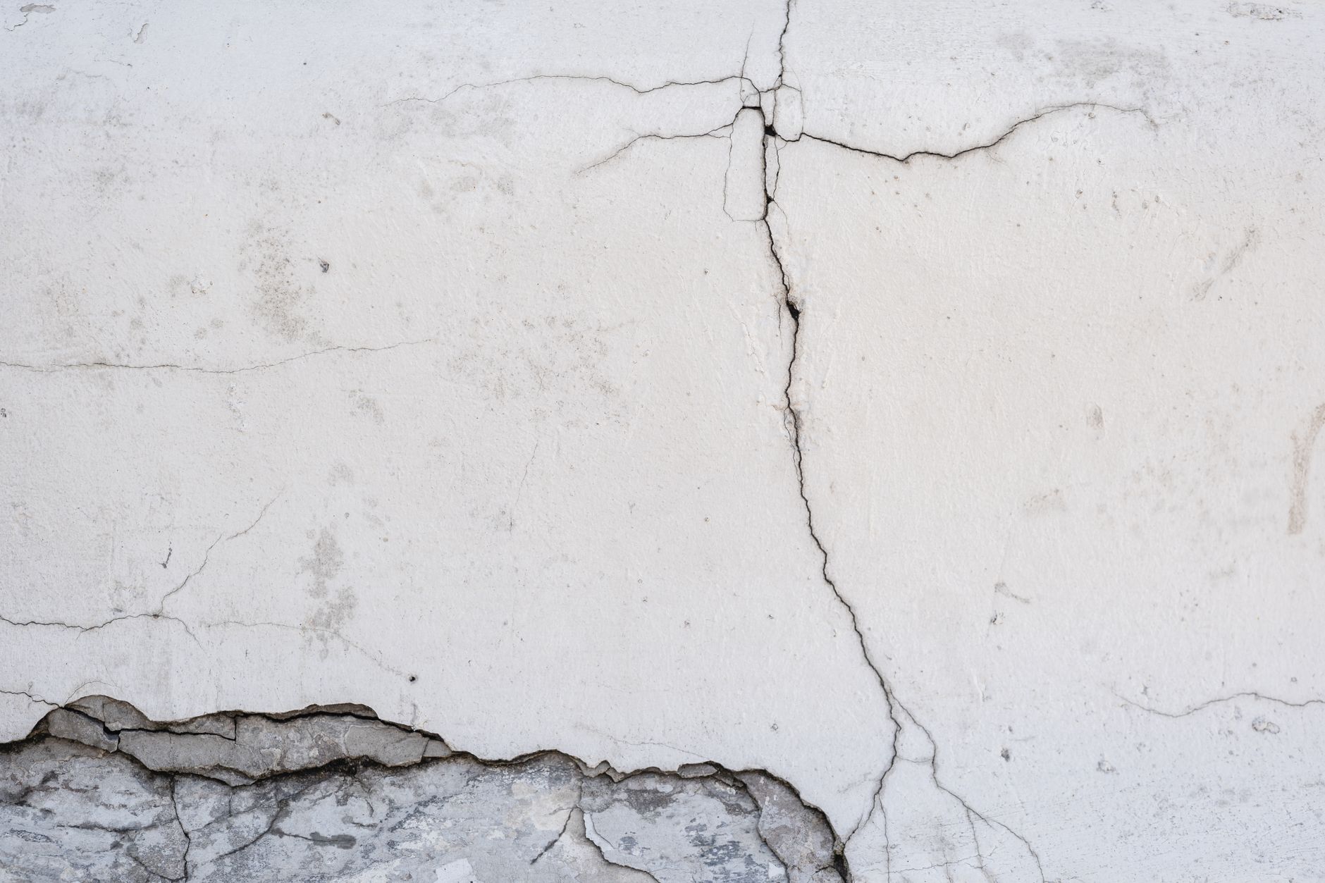 cracked sinking concrete driveway