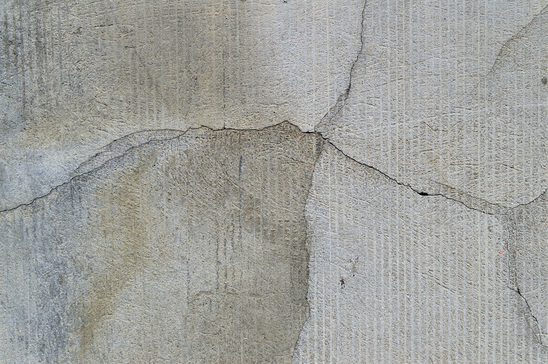 cracked sinking concrete driveway